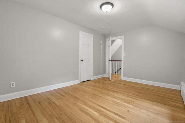 5 Brainerd Dr, Portland, CT 06480 - additional living space featuring light wood finished floors, lofted ceiling, and baseboards