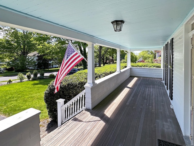 14 W Mystic Ave, Groton, CT 06355 - wooden porch featuring a yard