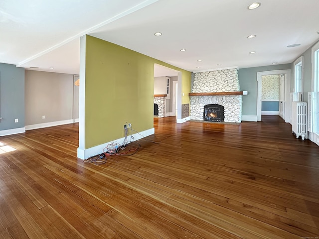 14 W Mystic Ave, Groton, CT 06355 - unfurnished living room featuring a fireplace, wood finished floors, and recessed lighting