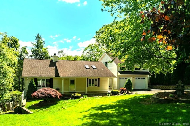 2 Topsfield Rd, Bristol, CT 06010 - view of front of property featuring a front lawn, a chimney, and driveway