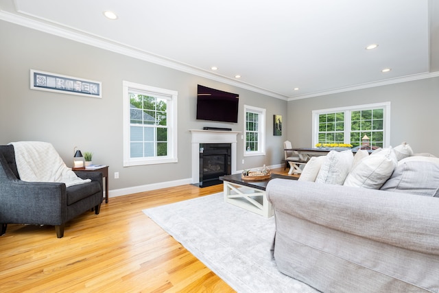 9 Tall Wood Dr, East Hampton, CT 06424 - living room with plenty of natural light, light wood-type flooring, recessed lighting, ornamental molding, and baseboards