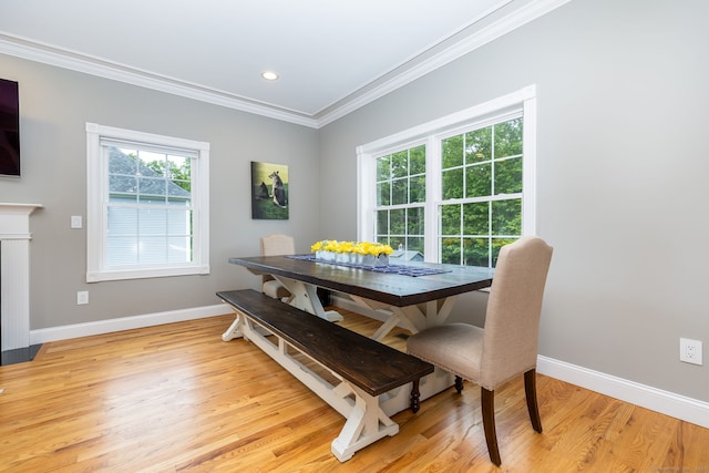9 Tall Wood Dr, East Hampton, CT 06424 - dining area with crown molding, baseboards, light wood-type flooring, and recessed lighting