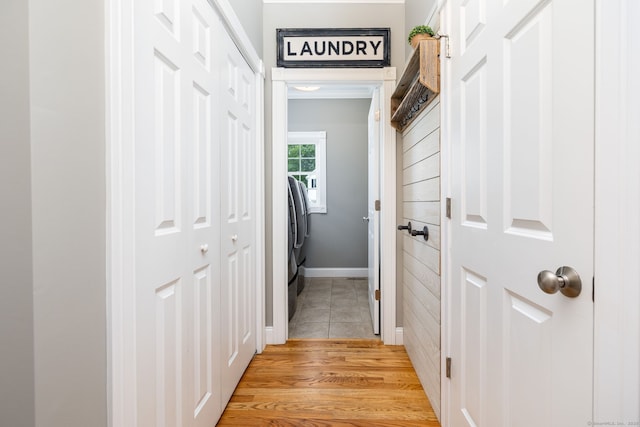 9 Tall Wood Dr, East Hampton, CT 06424 - corridor with washer and dryer, light wood-type flooring, and baseboards