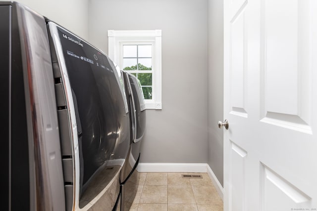 9 Tall Wood Dr, East Hampton, CT 06424 - washroom featuring baseboards, washer and clothes dryer, and light tile patterned flooring