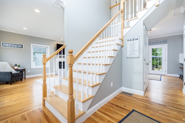 9 Tall Wood Dr, East Hampton, CT 06424 - staircase with ornamental molding, baseboards, wood finished floors, and recessed lighting