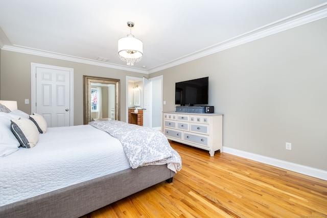 9 Tall Wood Dr, East Hampton, CT 06424 - bedroom featuring crown molding, baseboards, light wood finished floors, and ensuite bath