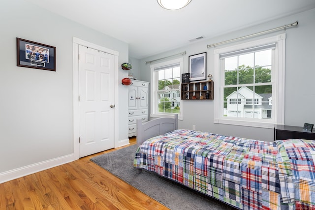 9 Tall Wood Dr, East Hampton, CT 06424 - bedroom featuring wood finished floors and baseboards