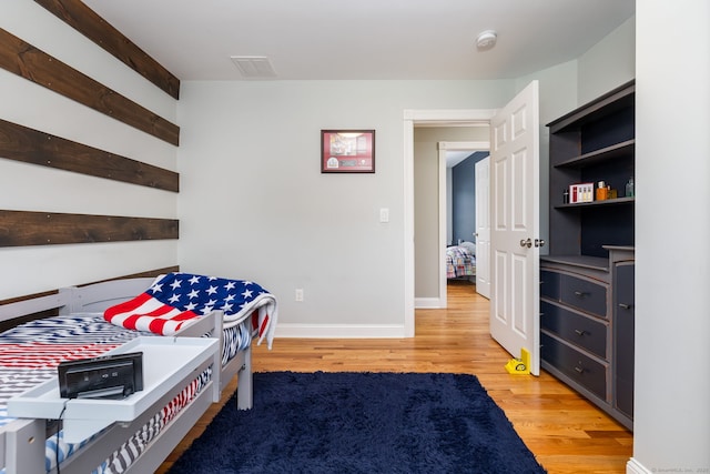 9 Tall Wood Dr, East Hampton, CT 06424 - bedroom with light wood-type flooring and baseboards
