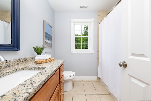 9 Tall Wood Dr, East Hampton, CT 06424 - bathroom with vanity, toilet, baseboards, tile patterned flooring, and curtained shower