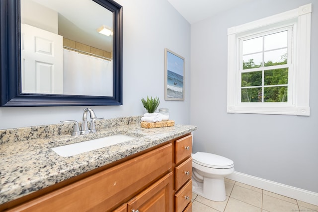 9 Tall Wood Dr, East Hampton, CT 06424 - bathroom with vanity, toilet, tile patterned flooring, and baseboards