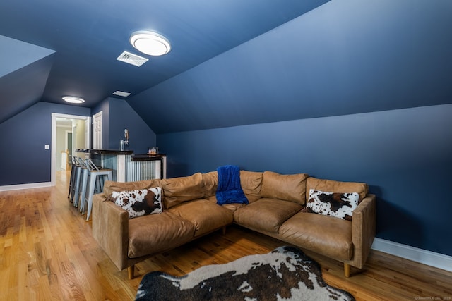 9 Tall Wood Dr, East Hampton, CT 06424 - home theater room featuring baseboards, vaulted ceiling, and wood finished floors