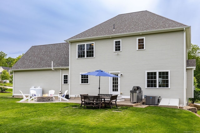 9 Tall Wood Dr, East Hampton, CT 06424 - back of house with a patio, a lawn, and a fire pit