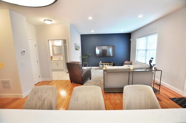 35 Ringgold St Unit 401, West Hartford, CT 06119 - living room featuring recessed lighting, wood finished floors, and baseboards