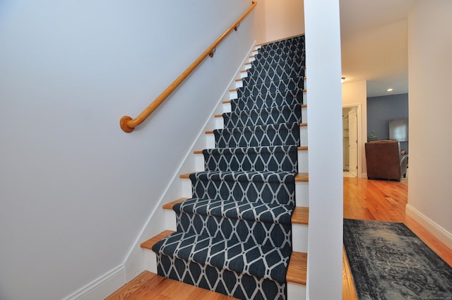35 Ringgold St Unit 401, West Hartford, CT 06119 - staircase featuring wood finished floors and baseboards