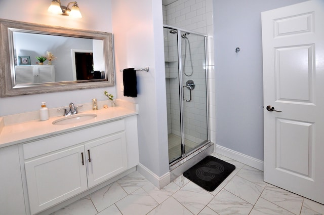35 Ringgold St Unit 401, West Hartford, CT 06119 - bathroom featuring marble look tiles, a stall shower, vanity, and baseboards