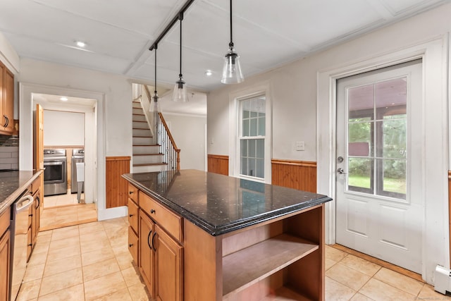 27 Maple St, Berlin, CT 06037 - kitchen featuring range, wainscoting, wood walls, light tile patterned flooring, and dishwasher