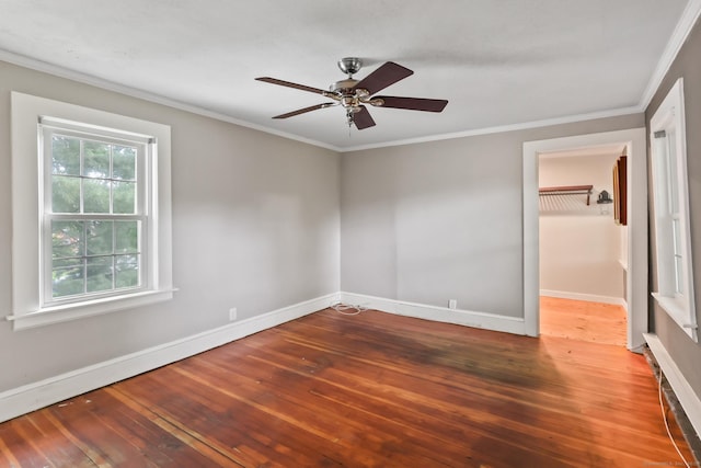 27 Maple St, Berlin, CT 06037 - spare room featuring hardwood / wood-style flooring, baseboards, crown molding, and a ceiling fan