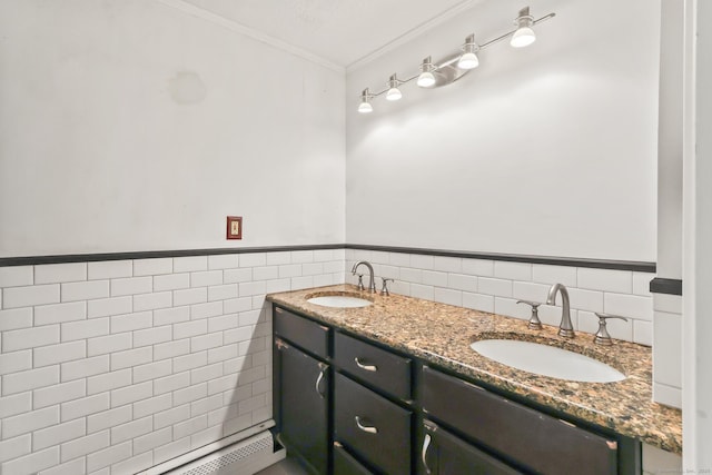 27 Maple St, Berlin, CT 06037 - full bath featuring ornamental molding, double vanity, tile walls, and a wainscoted wall