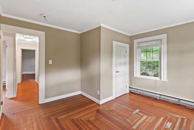 27 Maple St, Berlin, CT 06037 - empty room featuring ornamental molding, baseboards, and a baseboard heating unit