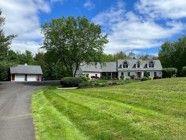 91 Hopkins Rd, Ellington, CT 06029 - cape cod house featuring a front yard, a garage, an outdoor structure, and driveway