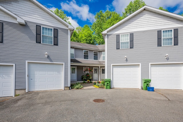 2118 Meriden Waterbury Tpke Unit 18, Southington, CT 06444 - view of front facade with a garage and driveway