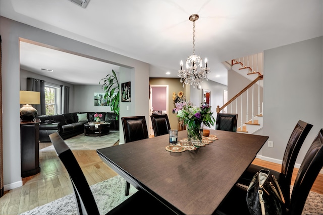 2118 Meriden Waterbury Tpke Unit 18, Southington, CT 06444 - dining room with stairway, light wood-type flooring, baseboards, recessed lighting, and a chandelier