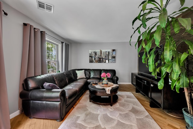 2118 Meriden Waterbury Tpke Unit 18, Southington, CT 06444 - living room featuring wood finished floors and baseboards