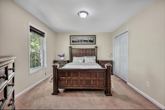 2118 Meriden Waterbury Tpke Unit 18, Southington, CT 06444 - bedroom with light colored carpet, baseboards, and a closet