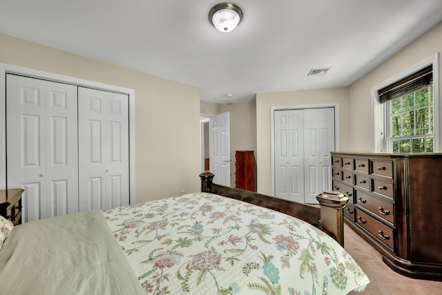 2118 Meriden Waterbury Tpke Unit 18, Southington, CT 06444 - carpeted bedroom featuring two closets