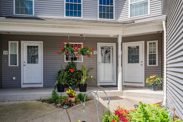 2118 Meriden Waterbury Tpke Unit 18, Southington, CT 06444 - doorway to property featuring covered porch