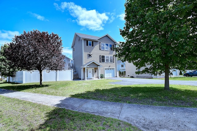 105 Scott St, Naugatuck, CT 06770 - view of front facade with asphalt driveway, an attached garage, and stairs