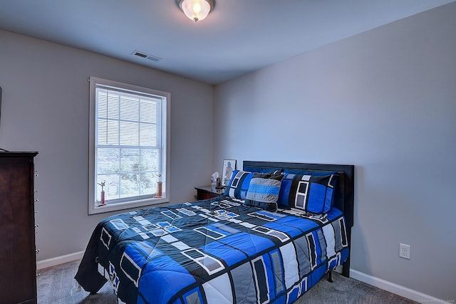 105 Scott St, Naugatuck, CT 06770 - carpeted bedroom with multiple windows and baseboards