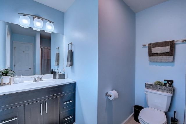105 Scott St, Naugatuck, CT 06770 - bathroom with toilet, vanity, and baseboards