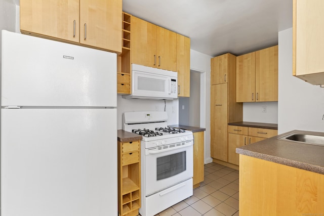 39 Glenbrook Rd Apt 2A, Stamford, CT 06902 - kitchen with white appliances, open shelves, dark countertops, a sink, and light tile patterned floors