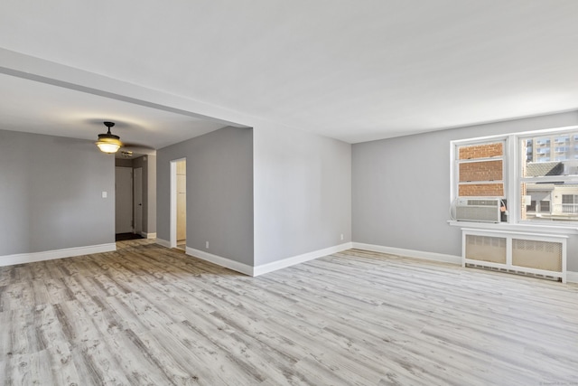 39 Glenbrook Rd Apt 2A, Stamford, CT 06902 - spare room with wood finished floors, baseboards, ceiling fan, and cooling unit