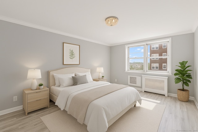 39 Glenbrook Rd Apt 2A, Stamford, CT 06902 - bedroom with baseboards, ornamental molding, and light wood-type flooring