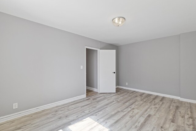 39 Glenbrook Rd Apt 2A, Stamford, CT 06902 - unfurnished room with wood finished floors and baseboards