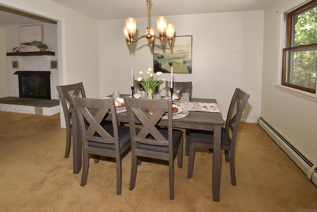 169 Brookfield St, South Windsor, CT 06074 - dining room with a baseboard heating unit, light carpet, a chandelier, and a brick fireplace