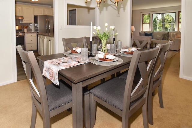 169 Brookfield St, South Windsor, CT 06074 - dining room featuring light colored carpet and a chandelier