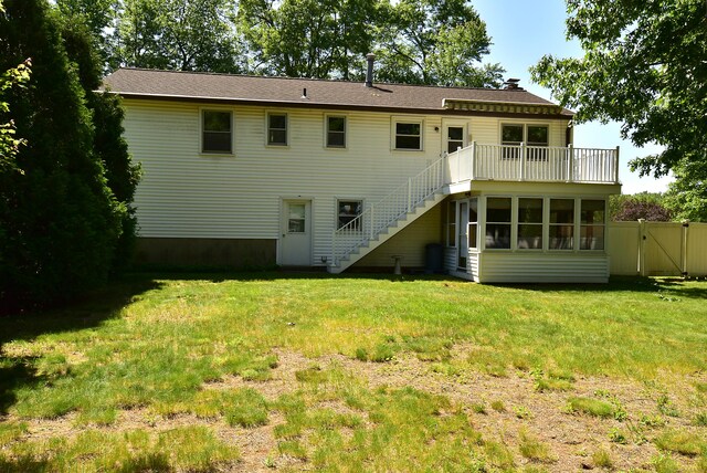 169 Brookfield St, South Windsor, CT 06074 - rear view of house featuring stairway and a gate