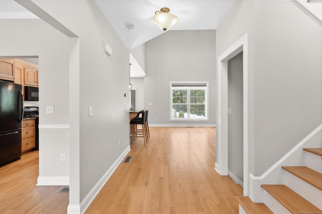 584 Meriden Ave Unit 1, Southington, CT 06489 - hall with light wood-style floors, baseboards, stairs, and lofted ceiling