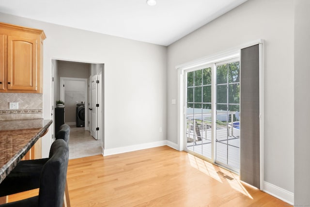 584 Meriden Ave Unit 1, Southington, CT 06489 - unfurnished dining area featuring baseboards, light wood-type flooring, washer / clothes dryer, and recessed lighting