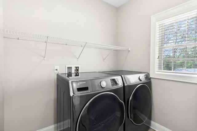 584 Meriden Ave Unit 1, Southington, CT 06489 - laundry room with washer and dryer and baseboards