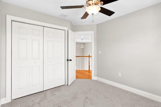 584 Meriden Ave Unit 1, Southington, CT 06489 - unfurnished bedroom with carpet flooring, a closet, baseboards, and a ceiling fan