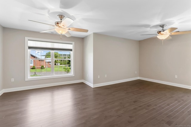 584 Meriden Ave Unit 1, Southington, CT 06489 - spare room with dark wood-style flooring, a ceiling fan, and baseboards