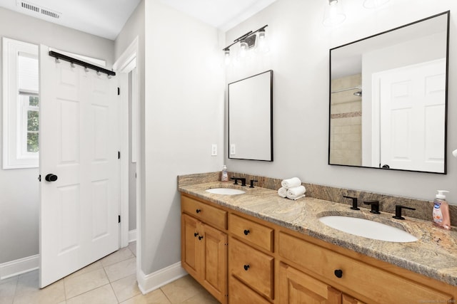 584 Meriden Ave Unit 1, Southington, CT 06489 - full bathroom featuring double vanity, baseboards, tile patterned floors, and a shower