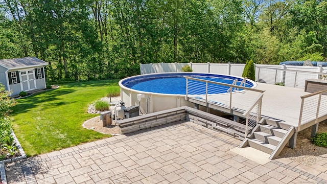 584 Meriden Ave Unit 1, Southington, CT 06489 - view of swimming pool featuring an outbuilding, a wooden deck, and a patio