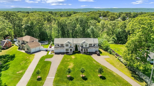 584 Meriden Ave Unit 1, Southington, CT 06489 - view from above of property featuring a heavily wooded area