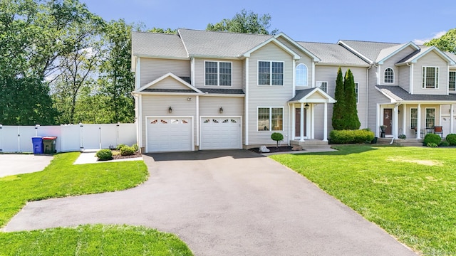584 Meriden Ave Unit 1, Southington, CT 06489 - view of front of property with driveway, a gate, and an attached garage
