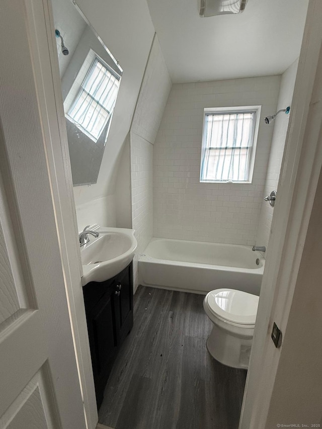 33 Wakefield Ct, New Britain, CT 06053 - bathroom featuring toilet, vanity, wood finished floors, and healthy amount of natural light